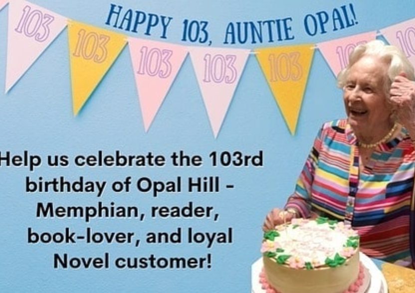 A pastel sign reading Happy 103, Auntie Opal, asking the community to celebrate with a book donation